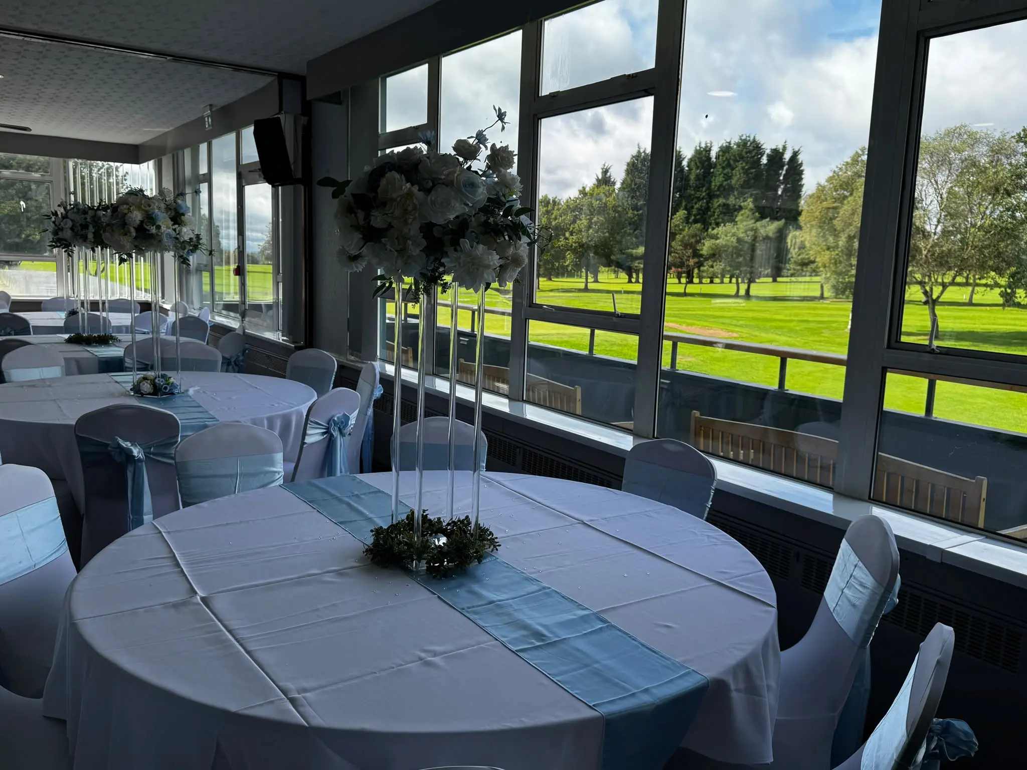 Dudley Golf Club function room with decorated tables and views across the course
